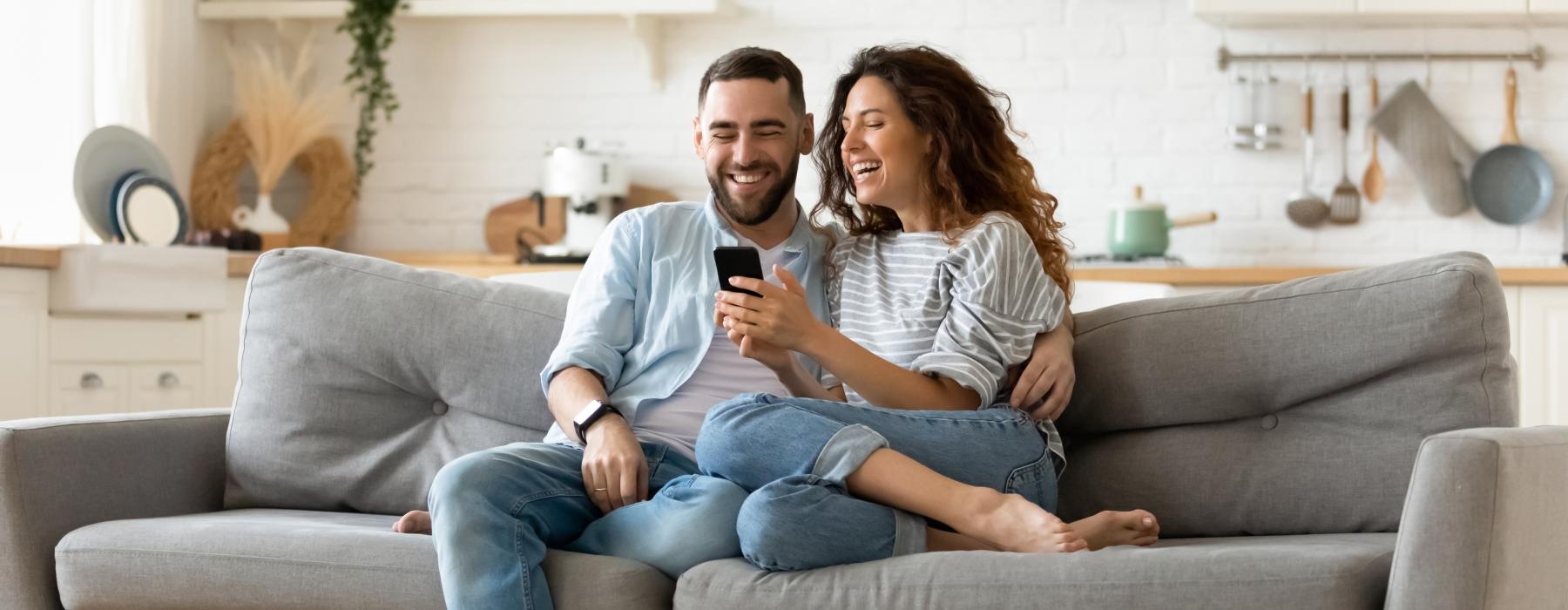 a man and a woman sitting on a couch